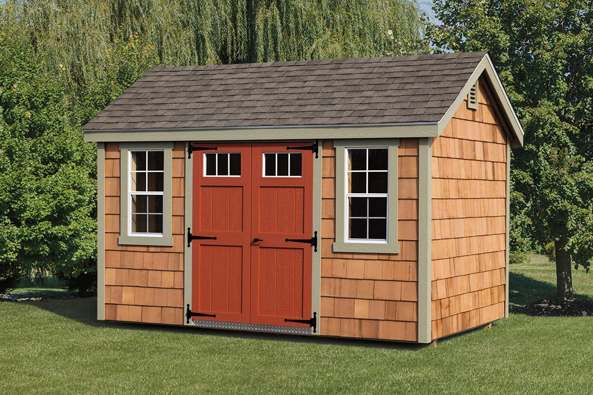 Heritage New England Shed: cedar shake new england shed with olive green trim. Manufacturer example configuration; optional features may be shown.