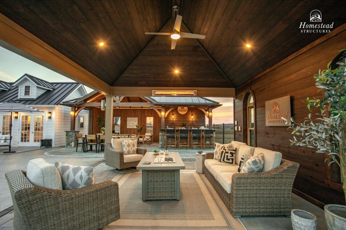 Homestead Structures Belmar Pavilion: Interior ceiling and evening setting. Manufacturer project example; furnishings, appliances and optional finishes are not confirmed inclusions.