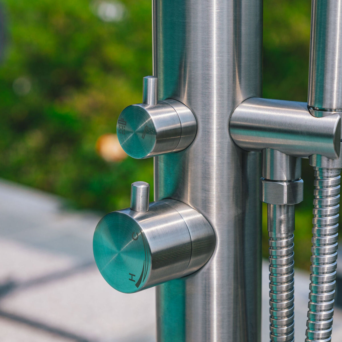 Rain Therapy PS PH-1051 brushed stainless steel mixing and diverter controls, handheld-shower holder and hose connections in the manufacturer's close-up photograph