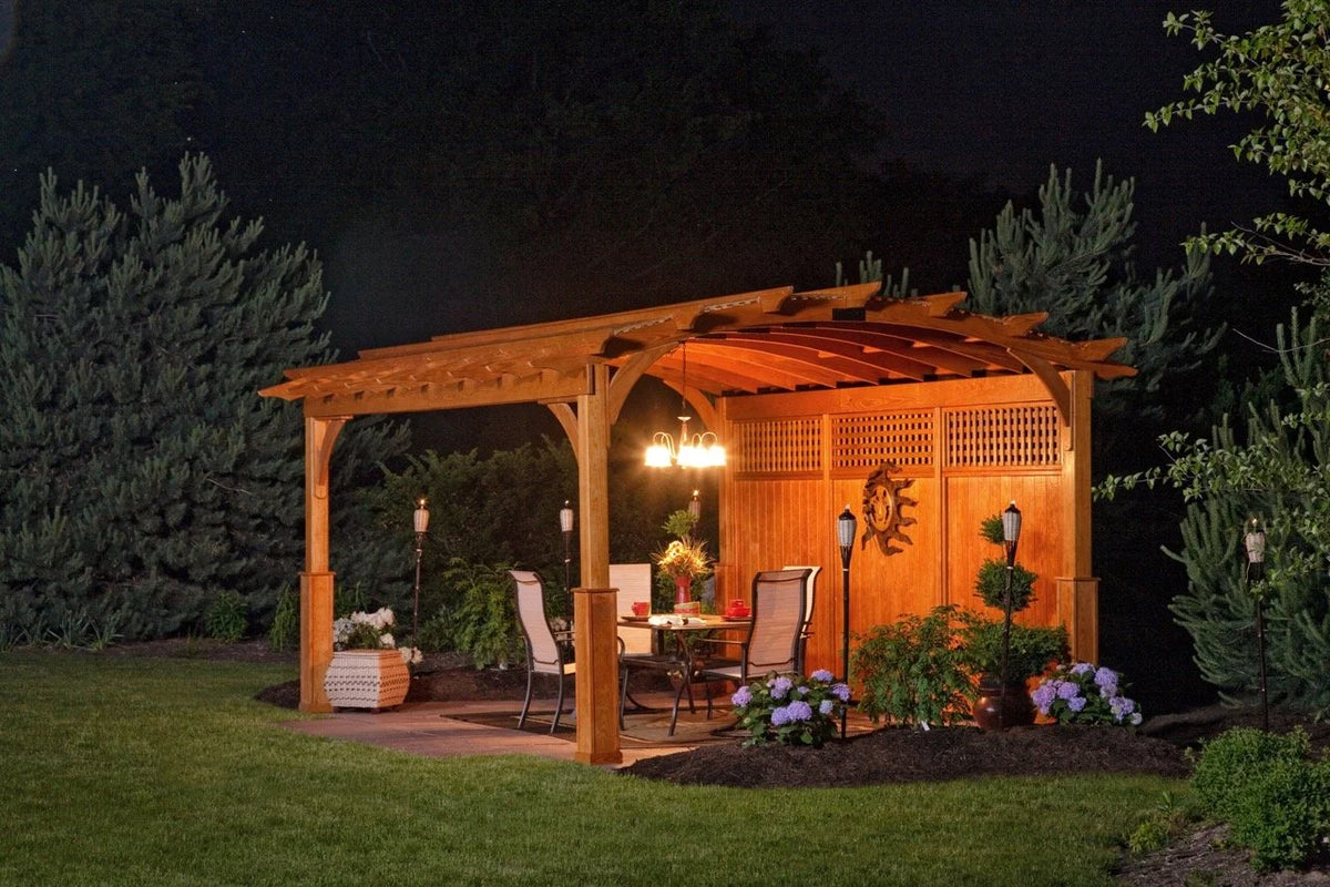 Creative Gazebos Cozy Arch Wood Pergola: 12x16 Cozy Arch Pergola w/Privacy Wall & Post Skirts. Manufacturer family example; size, finishes and optional features vary.