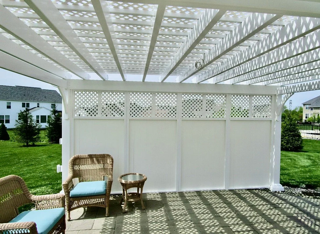 Creative Gazebos Elegant Vinyl Pergola: Elegant Vinyl pergola, privacy-wall and lattice example. Manufacturer example; size, finish and optional features vary.