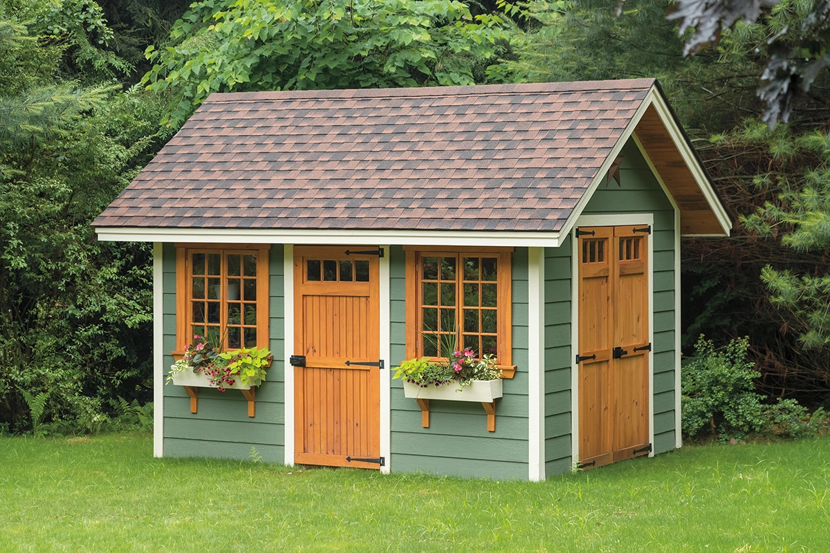 Heritage Nantucket Shed: nantucket style garden shed with flower boxes and wooden doors. Manufacturer example configuration; optional features may be shown.