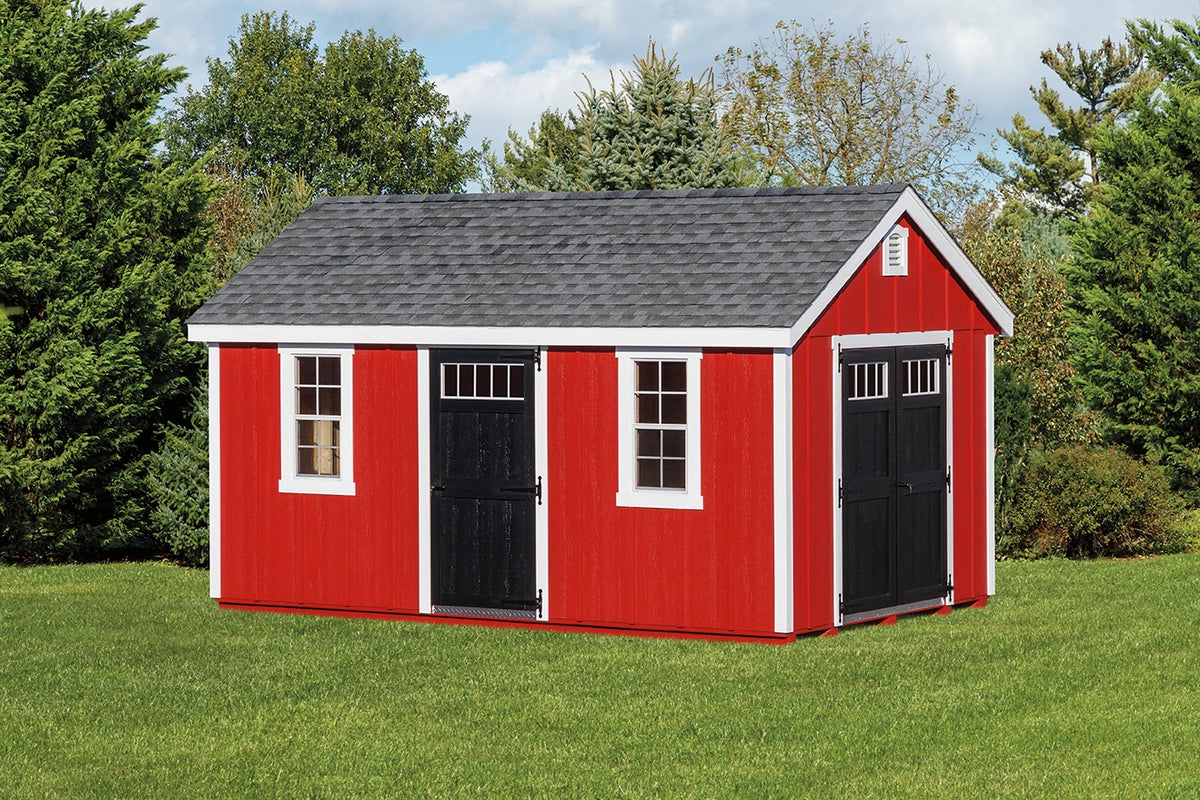Heritage New England Shed: red exterior with white trim, double doors and transom windows. Manufacturer example configuration; optional features may be shown.