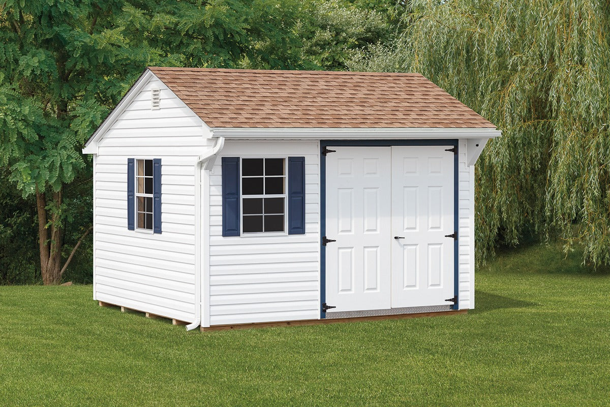 Heritage Traditional Shed: white shed with navy blue shutters and double doors. Manufacturer example configuration; optional features may be shown.
