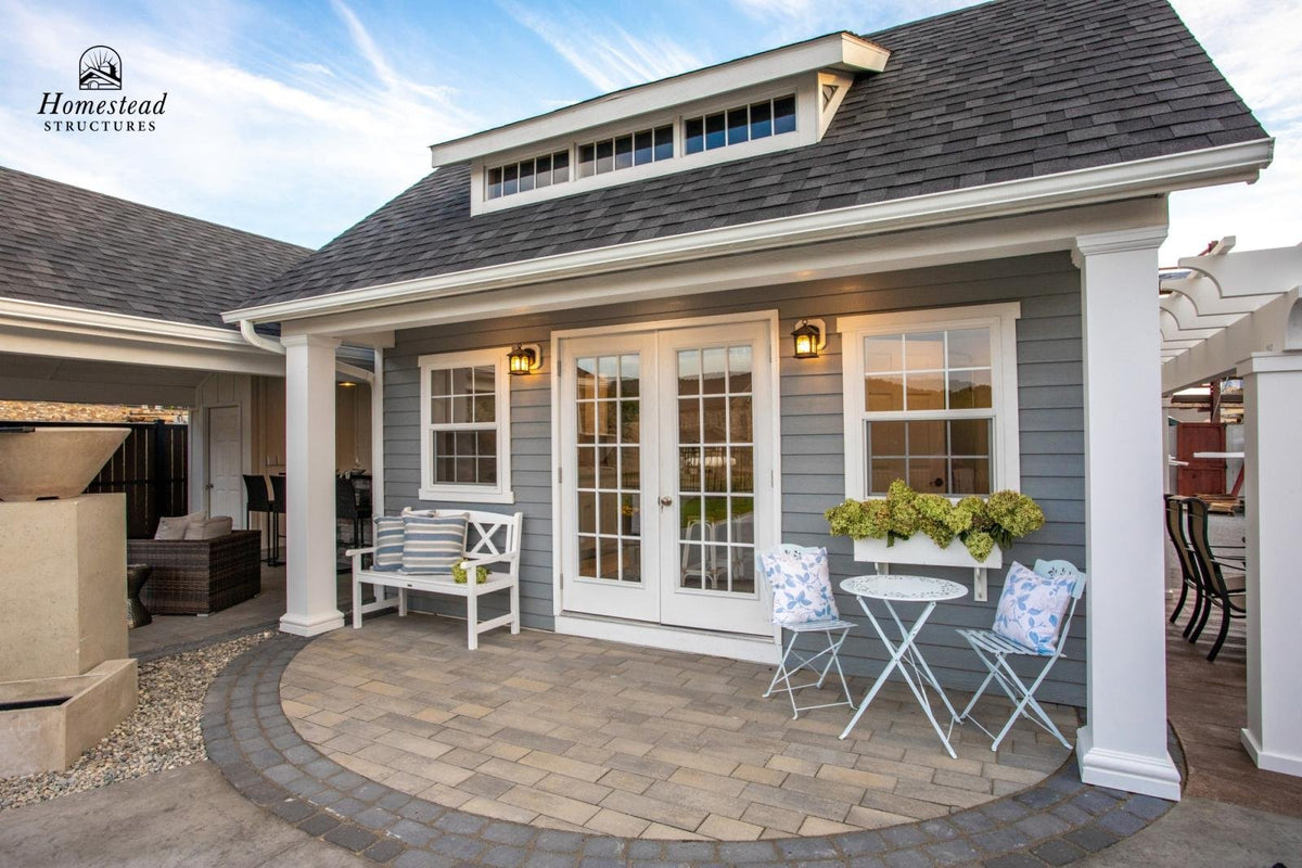 Homestead Structures Liberty Pool House: Exterior and entry detail. Manufacturer project example; furnishings, appliances and optional finishes are not confirmed inclusions.
