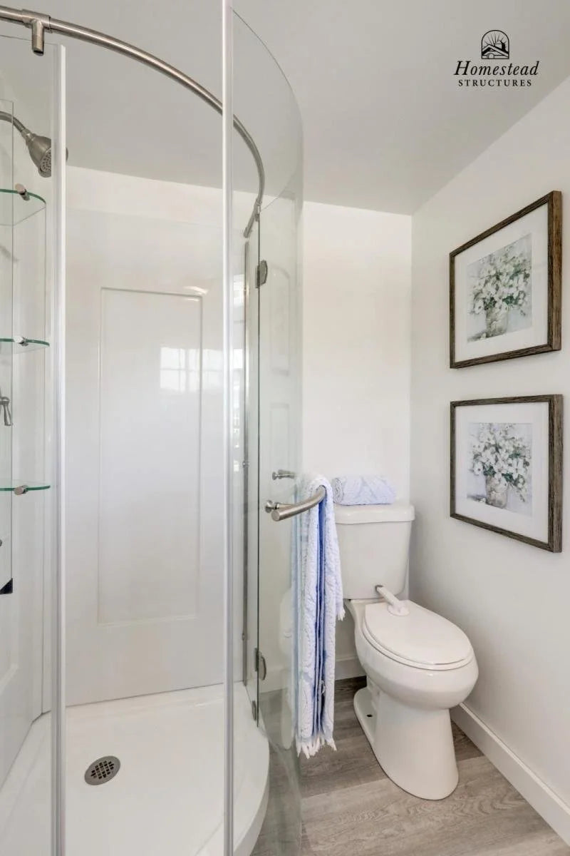 Homestead Structures Liberty Pool House: Optional bathroom example. Manufacturer project example; layout, finishes and appliances are quoted separately.