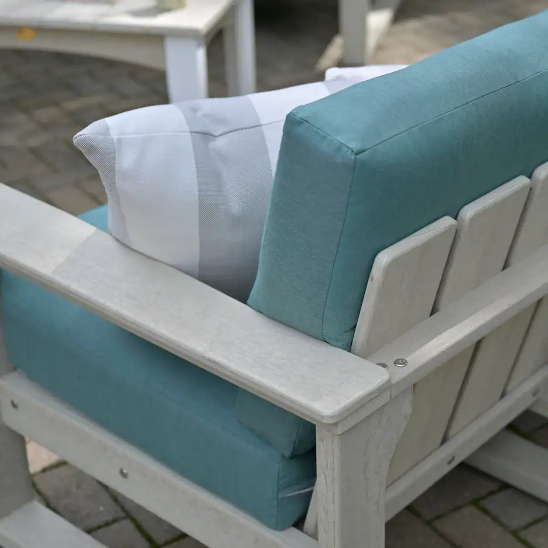 LuxCraft Lanai Deep Seating Sofa | LDSS: Armrest, slatted back and cushion detail. Manufacturer finish/fabric example