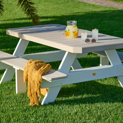 LuxCraft P6RPT, supplier angled lawn view in White, showing the tabletop and integrated benches. Manufacturer finish/configuration example; select the desired options separately. Tableware, blankets and decorative accessories are not included.