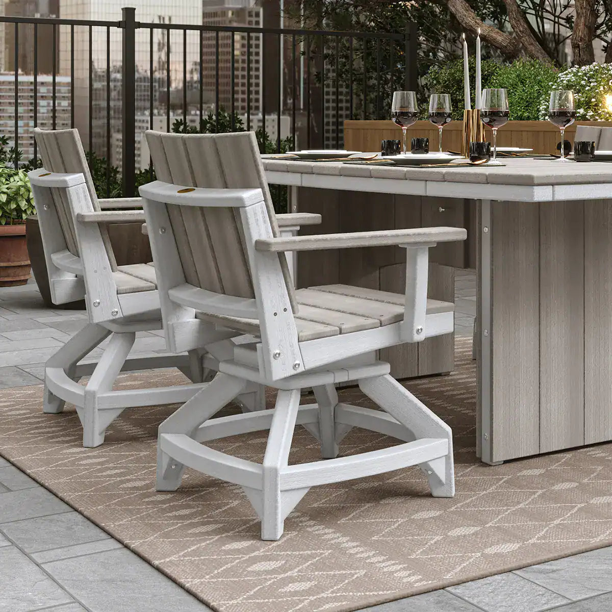 LuxCraft USWC, supplier patio view showing the Urban Swivel Chair with light-colored frame and gray-toned slats. Manufacturer finish/configuration example; select the desired options separately. Other furniture, throw pillows, blankets and decorative accessories are not included.