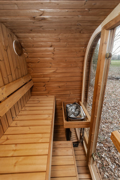 Mande Spa MW12 Outdoor Sauna — 2–3 Person, manufacturer photograph: interior seating and heater position; example configuration, options may vary