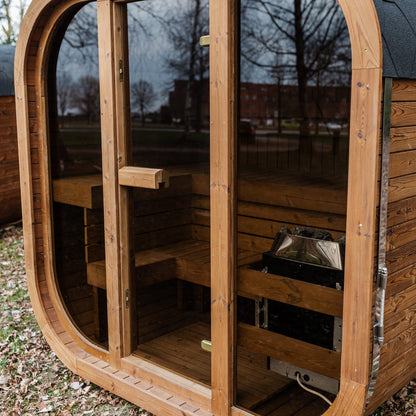 Mande Spa MW16 Outdoor Sauna — Up to 4 Person, manufacturer photograph: glass entry and interior; example configuration, options may vary