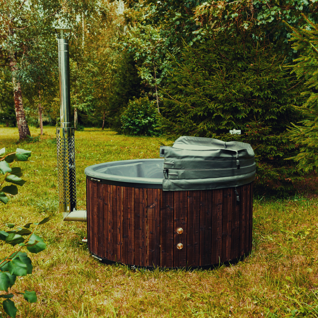 Mande Spa MWT4 Wood-Fired Hot Tub — 4 Person: Rear view showing the folded cover and exterior fittings. Manufacturer configuration example; confirm inclusions with your quote