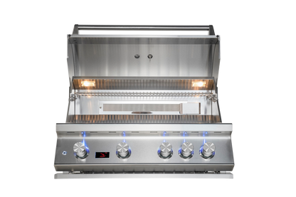 Whistler CBB4 34-inch four-burner grill with hood open, showing cooking area, warming rack and interior lights